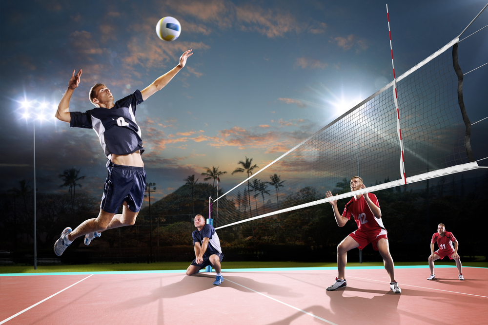 Professional,Volleyball,Players,In,Action,On,The,Night,Court